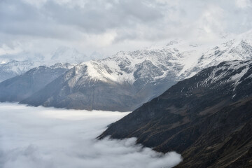 Sea of clouds floods the Azau Glade near the Mount Elbrus
