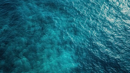 Fototapeta na wymiar Blue sea water surface. Top view