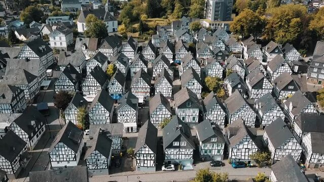 A drone flies over the identical houses of Freudenberg, Germany