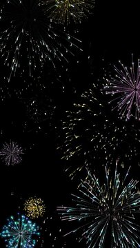 Colorful fireworks create a luxurious evening. Vertical screen background loop video.