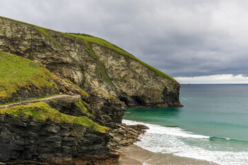 Clouds over the sea and cliffs of Trebarwith Beach, Cornwall, England, UK
