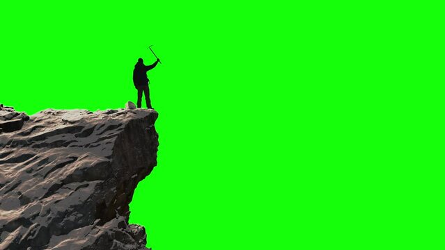 Adventure Man Hiker standing on top of Icy Mountain Mountain Peak. Composite Cutout with Green Screen Background.