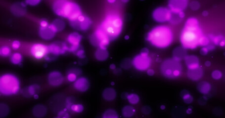 Abstract purple blurred holiday background with magical bokeh of glowing bright light energy small particles of flying dots on a black background