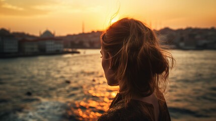 Rear view of woman watching sunset in Istanbul, woman traveling in summer Turkey, woman looking at scenery in Turkey, faceless travel footage, summer travel, travel in Europe