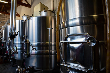 Steel tanks for first fermentation of grapes, Saint-Emilion wine making region picking, sorting...