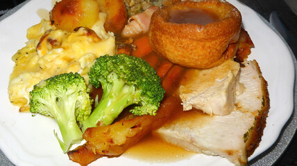 A plate of tasty meat and vegetables for Christmas dinner