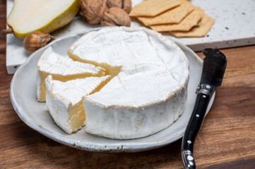 French soft Camembert cheese, original Camembert de Normandie, with white mold
