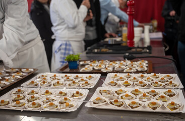 Degustation appetisers for visitors made by great chefs of high cuisine French restaurants, winter festival, Avenue de Champagne, Epernay, France