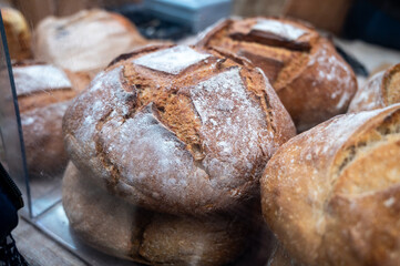 Sour dough bio bread made with natural yeast starter and baked in wood stove on market in France