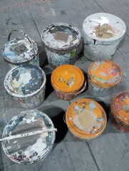 palette, paints, cans of paint, artist's workshop
