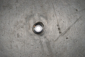 A ground LED light on asphalt