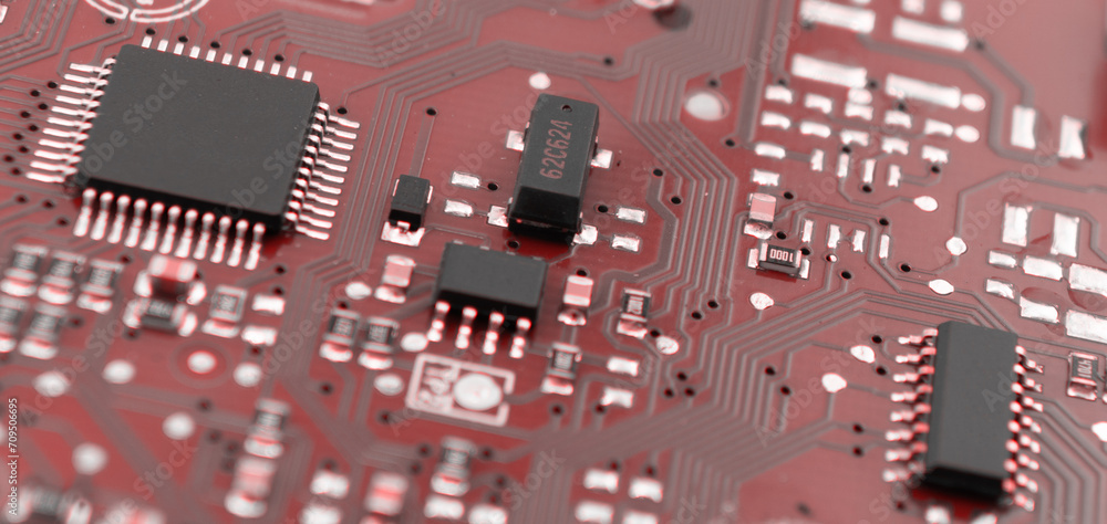 Poster circuit board with resistors microchips and electronic components background. computer hardware tech