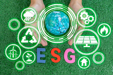 Model globe on hands, ESG icon for Environment Social and Governance, World sustainable environment...