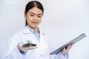 A biologist is studying the tissue of seedlings in the laboratory.