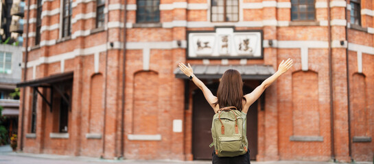 woman traveler visiting in Taiwan, Tourist sightseeing at Red House or old theater in Ximen, Taipei...