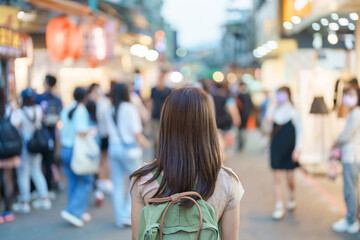 woman traveler visiting in Taiwan, Tourist with bag sightseeing and Shopping in Shilin Night...