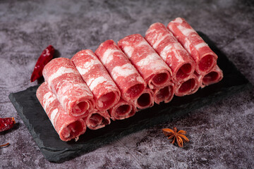 Slice of the fresh raw beef  or Beef rolls for shabu