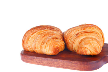 Crisp fresh croissants in the background