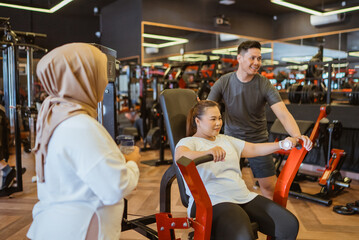 plus size woman practising fitness cardio in gymnasium