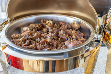 Roasted meat In Chaffing Dish at a Nigerian Party