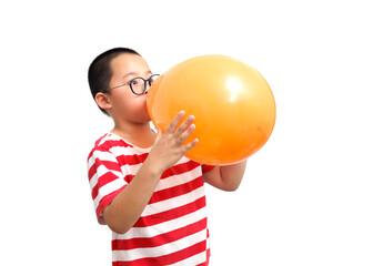 Chinese boy blow up a big balloon. isolated on white background.