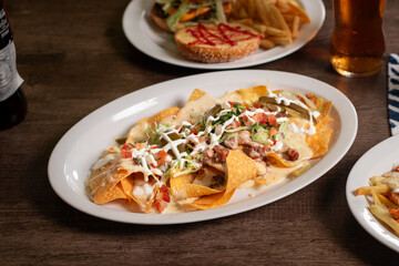 Carne Asada french fries and Cheeseburger with french fries
