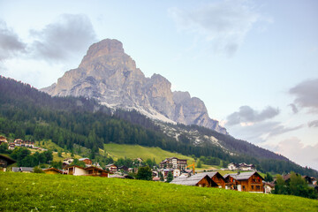 Fototapeta na wymiar Corvara village and Dolomite landscape in Alta Badia