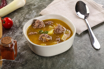 Soup with beef meatball and vegetables