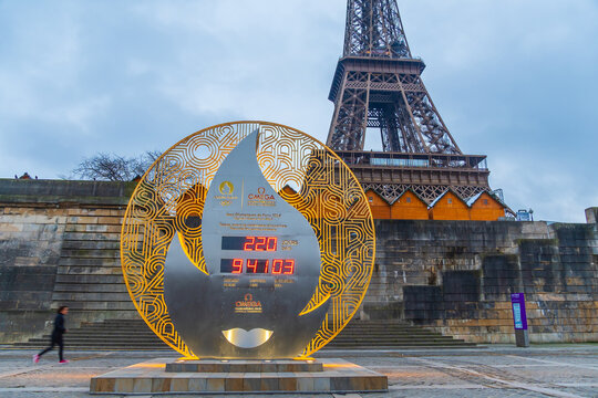 Countdown clock to the hours, minutes, and seconds until the opening Olympics ceremony of Paris 2024 in front of Eiffel Tower