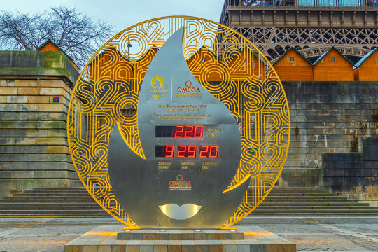 Countdown clock to the hours, minutes, and seconds until the opening Olympics ceremony of Paris 2024 in front of Eiffel Tower
