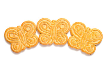 Cookies in the form of butterflies on a white background. Three cookies isolated.
