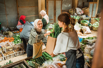 happy customer shopping fresh vegetable at farmer market