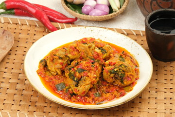 ayam rica rica kemangi,Spicy basil chicken is a Indonesian food, Indonesia traditional cuisine. Manadonese chicken dish