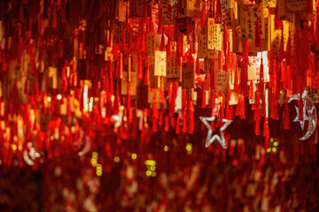 Close-up of Red Chinese Wishing Ribbons with Characters