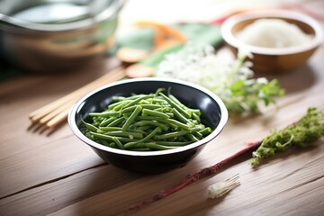 freshly steamed green beans on a rustic wooden table - obrazy, fototapety, plakaty