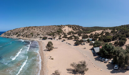 Crete, Greece, Gavdos island. Aerial drone view of sandy beach, wild landscape, ripple sea water.