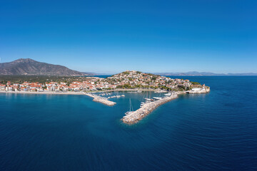 Fototapeta na wymiar Paralio Astros port, Arcadia, Peloponnese Greece. Aerial drone panoramic view of town, moored boat.