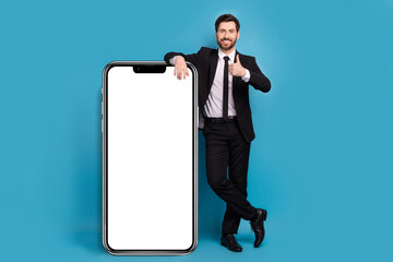 Full body length size cadre of positive successful thumb up rate feedback web page panel screen phone isolated on blue color background