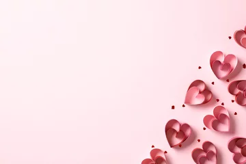 Fotobehang Top view St Valentines Day paper cut hearts with confetti on pink table. Flat lay. © photoguns