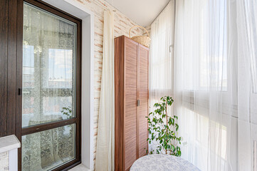 Fototapeta premium Russia, Moscow- May 27, 2020: interior apartment room balcony overlooking the street