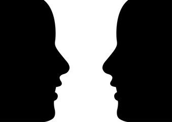 対面し見つめ合う人のシルエット。距離感の近い人間。客観的に自己分析するイメージ。