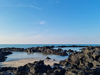This is a Jeju seascape with basalt rocks.