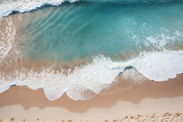 Fototapeta na wymiar Beautiful sandy beach and soft blue ocean wave, top-down view