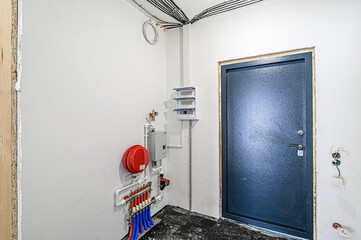 interior apartment room boiler room. heating system, pipes and appliances