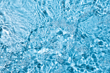 Water surface waving Close-up . Blue Water Flowing