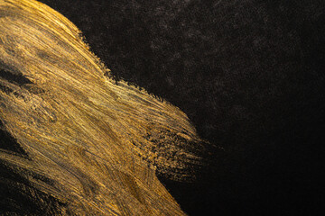 黒背景に金色のインク