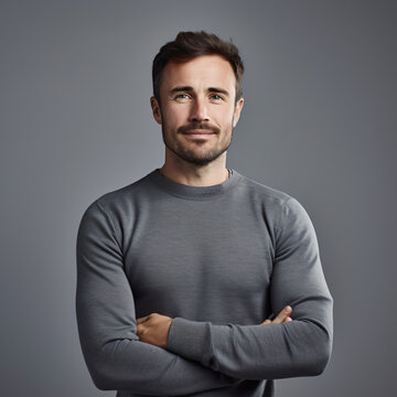 portrait of a dark haired middle aged man in casual outfit, isolated on grey background, created with generative AI technology