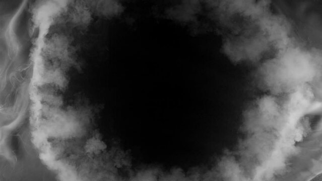 Super Slow Motion of White Smoke Texture Revealing Empty Round Space. Isolated on Black Background. Filmed on High Speed Cinema Camera.