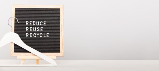 letter board with motivational quote and wood hanger