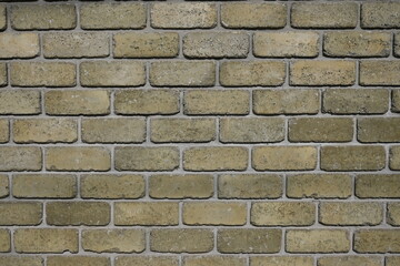 symmetrical brown brick lined fence background, brown brick wall for background 